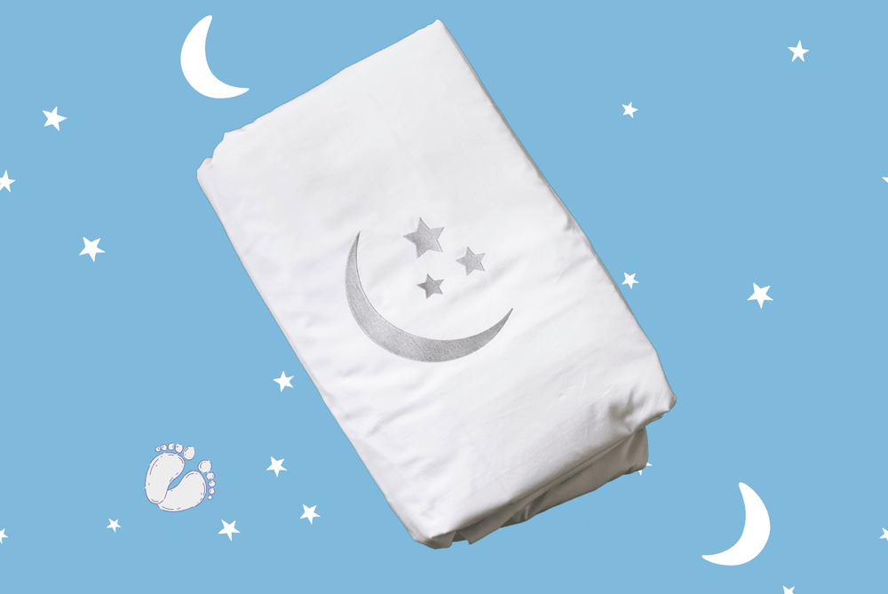 Moon and stars embroidered cot duvet cover in organic sateen cotton